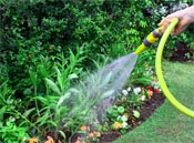 Use a hose nozzle to conserve water and avoid over-watering plants