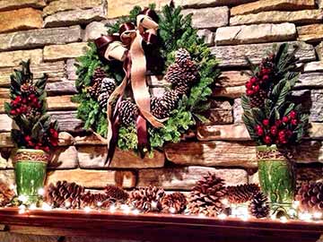 Natural wreath with evergreen branches and pine cones